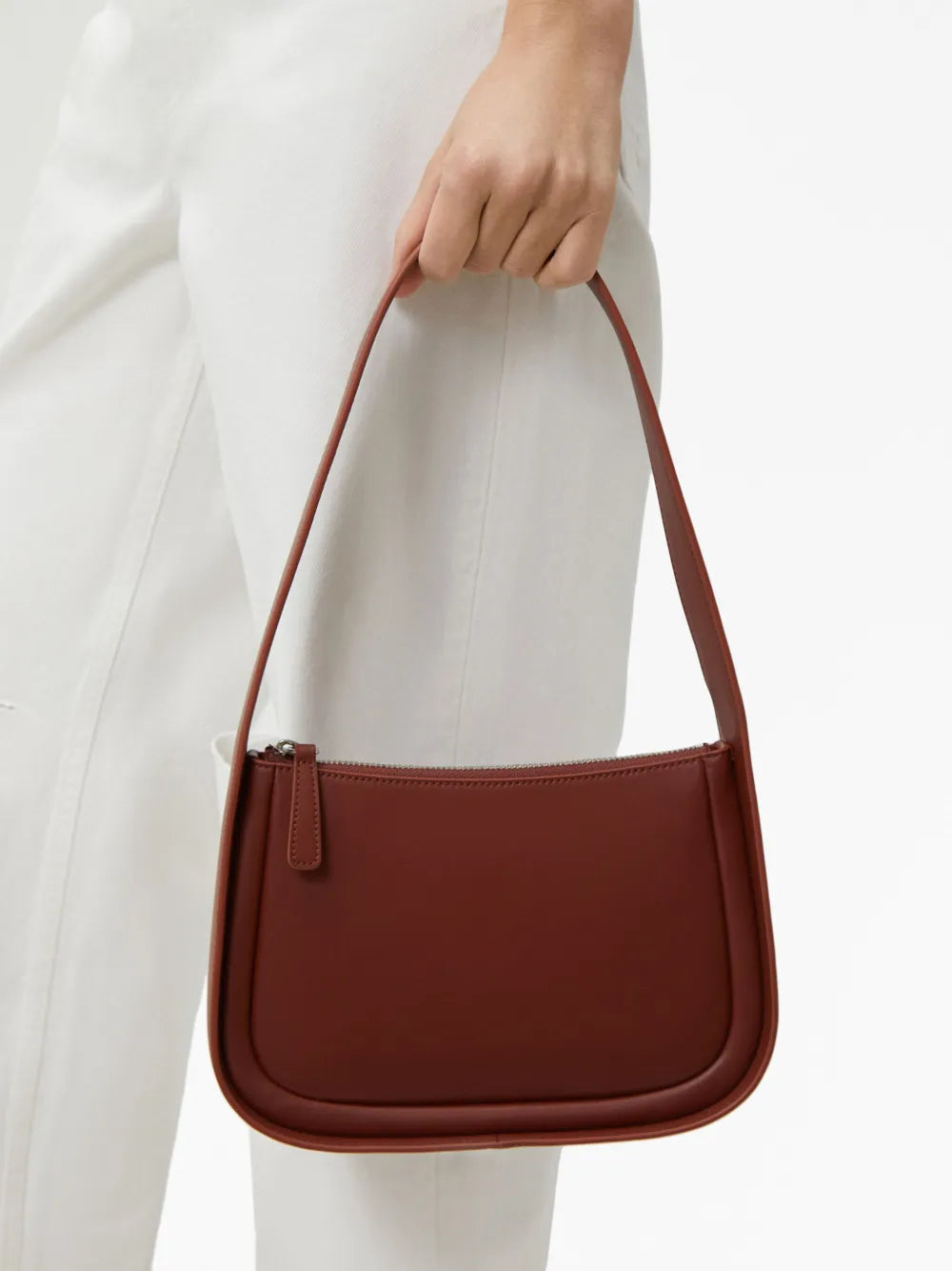 12 STOREEZcurved-corners leather mini bag